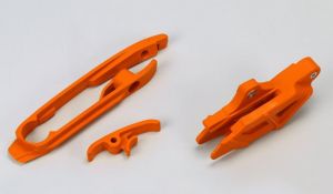 UFO vodítka reťaze zadné + predné KTM SX/SXF 11-15, oranžové